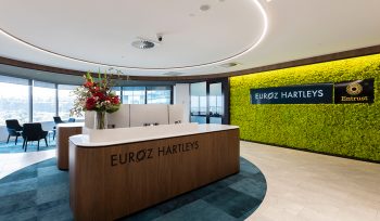 euroz hartley perth office new reception lobby area with statement green wall and views of perth foreshore