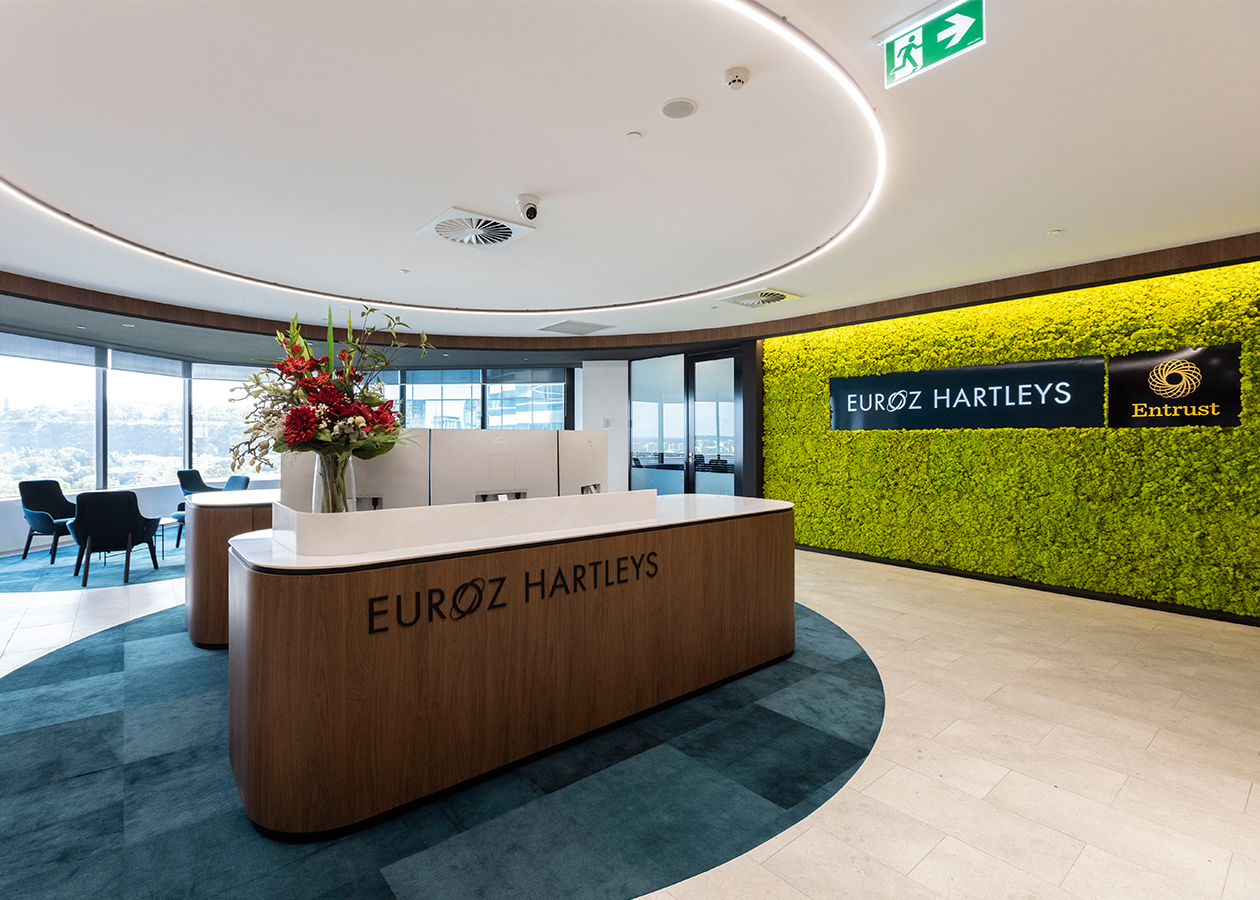 euroz hartley perth office new reception lobby area with statement green wall and views of perth foreshore